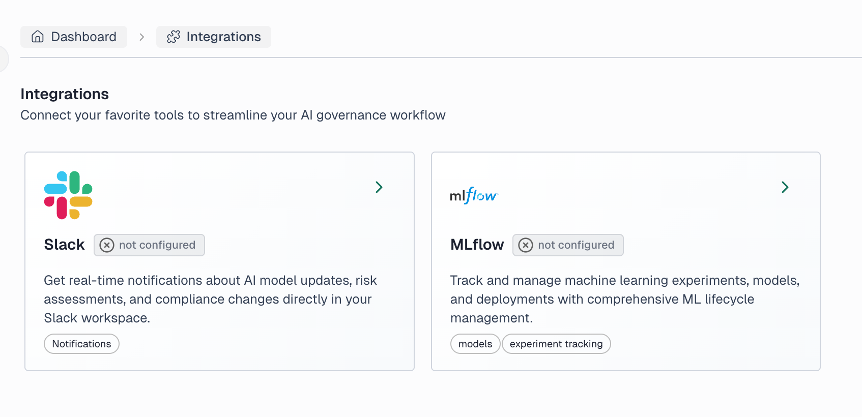 Integrations page showing Slack and MLflow integration cards with configuration status and descriptions